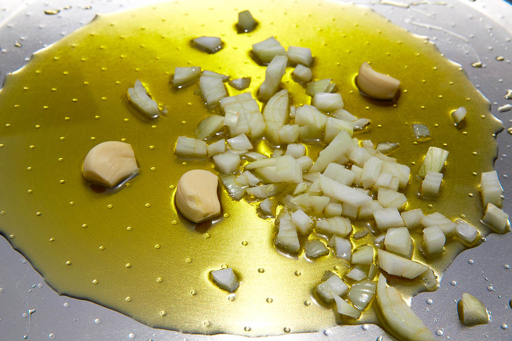 Car battery with green recycle sign.