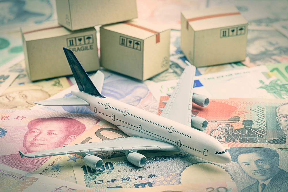 Car battery with green recycle sign.